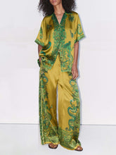 Pantalones anchos de satén con estampado floral único y exquisito